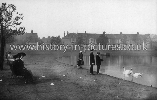 The Lake with Woodford Road & Bective Road in the background, Wanstead Flats, Forest Gate, London. c.1908.